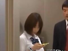 Japanese student got stuck between the elevator doors. Pervert standing in the elevator sees his chance and fucks the poor girl from behind.